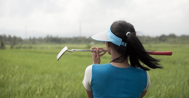 A Lady Caddy Who Never Saw a Hole in One