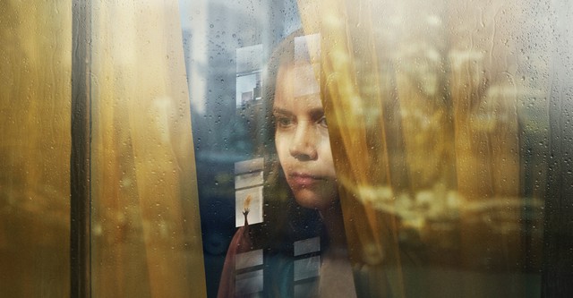 La mujer en la ventana