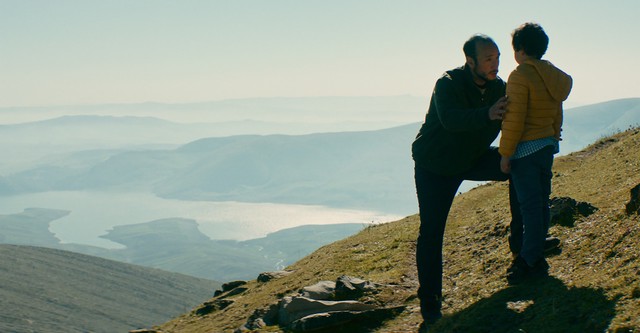 Behind the Mountains