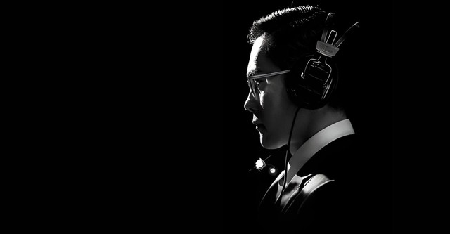 The Man Standing Next