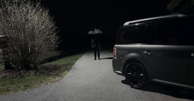 The Man with the Black Umbrella