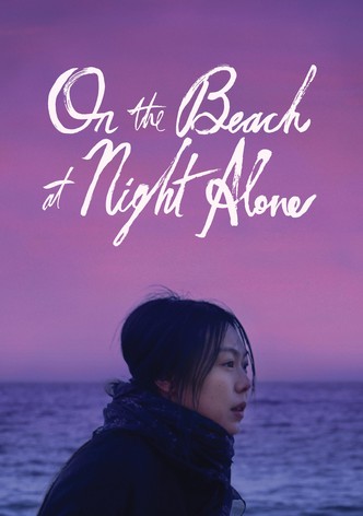 On the beach at night alone