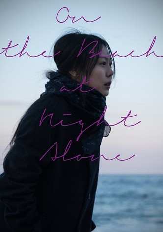 On the beach at night alone