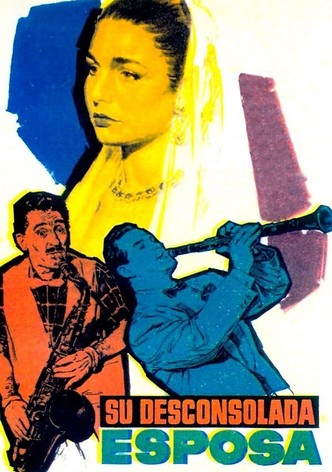 Su desconsolada esposa