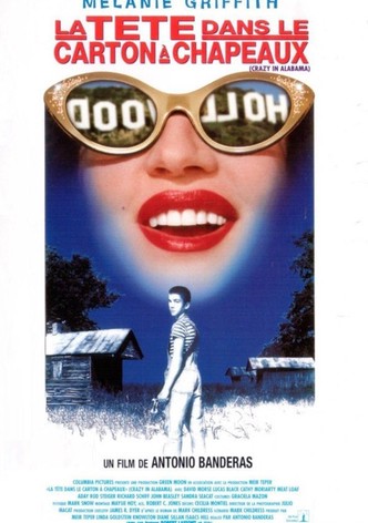 La Tête dans le carton à chapeaux