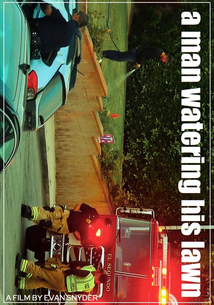 A Man Watering His Lawn