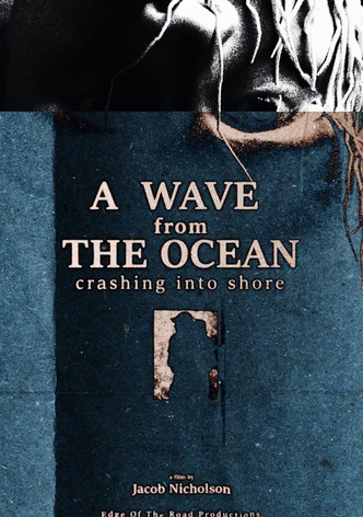 A Wave from the Ocean Crashing Into the Shore