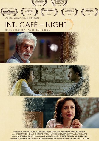 INT. CAFÉ – NIGHT